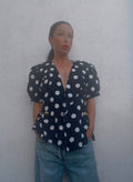 Blusa vintage lunares 90s negra con botones dorados