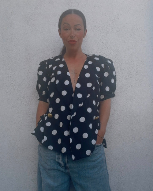 Blusa vintage lunares 90s negra con botones dorados